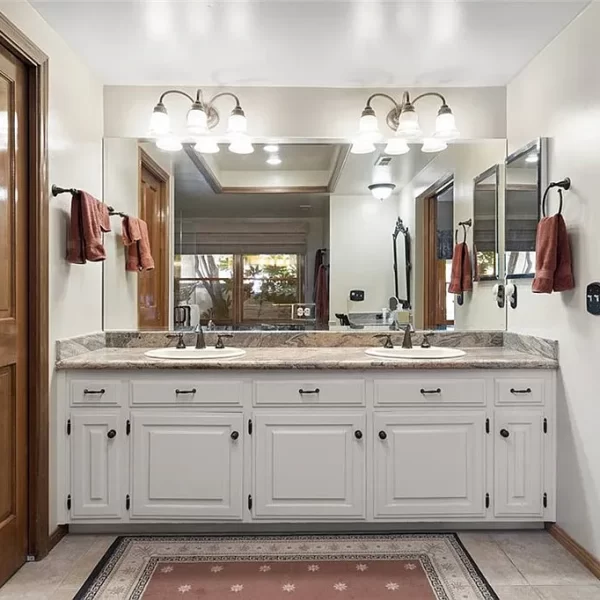 A large mirror for the bathroom vanity