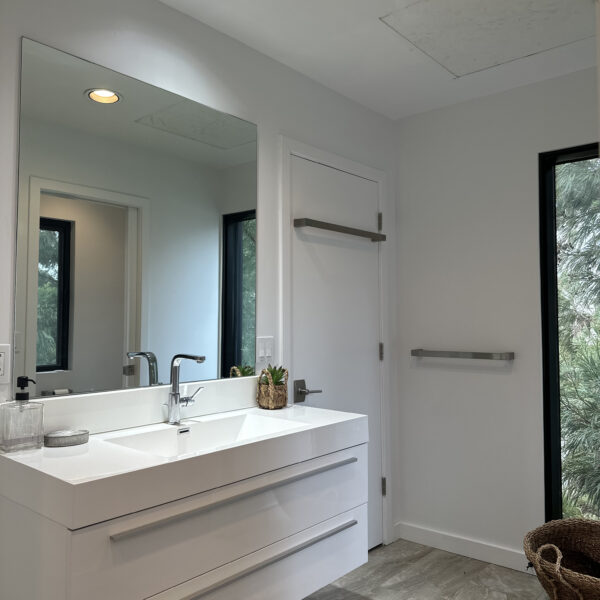 A bathroom vanity near the door